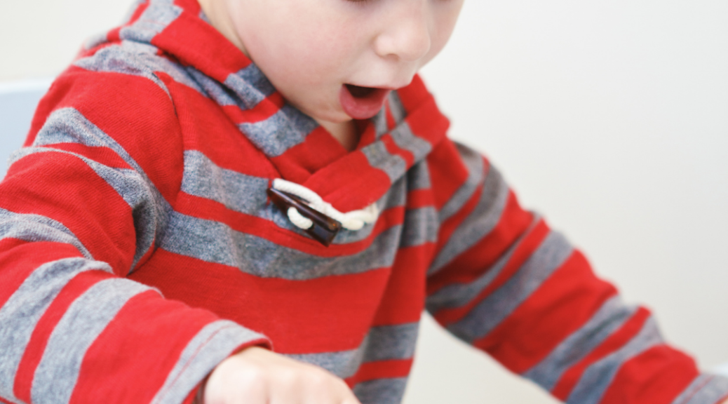 toddler throws toys instead of playing